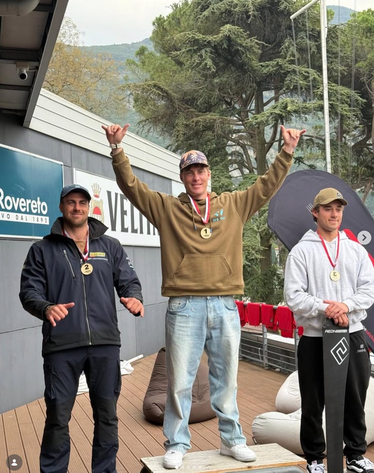 Daniele Benedetti on the top step of the Austrian Cup 2025 podium in Torbole, Lake Garda, with CHS Wind Solutions