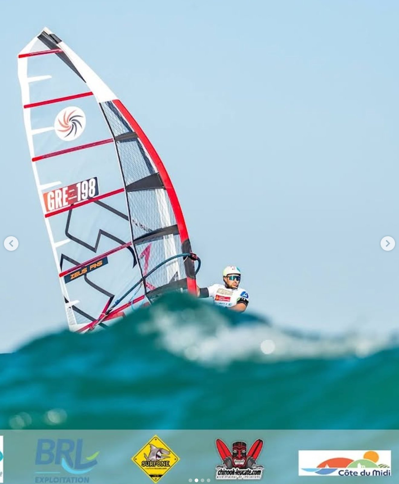 John Soukos GRE-198 riding a wave at the IFCA Foil Senior World Championship 2026 in Leucate with CHS Zeus FRS sail