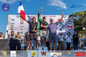 Klayton Silva BRA-7777 on the top step of the IFCA Master Fin Slalom World Championship 2026 podium at Leucate, Mondial du Vent