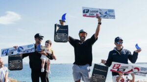 Klayton Silva on the top step of the 2026 Iberian Windsurf Cup podium holding the 1st place prize